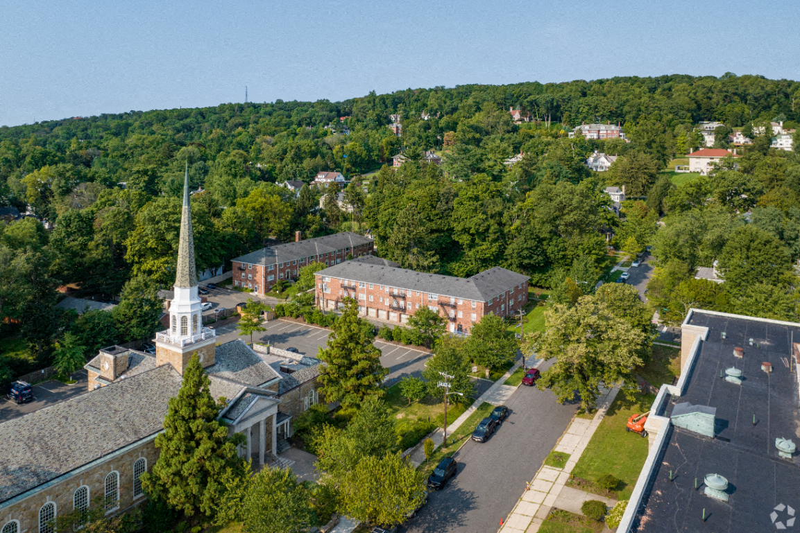 an aerial view of a church and buildings on the campus