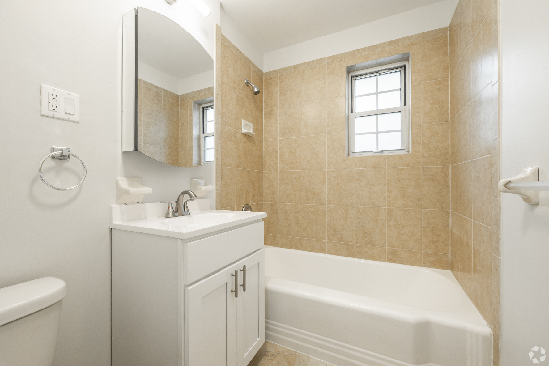 a bathroom with a sink and a bath tub