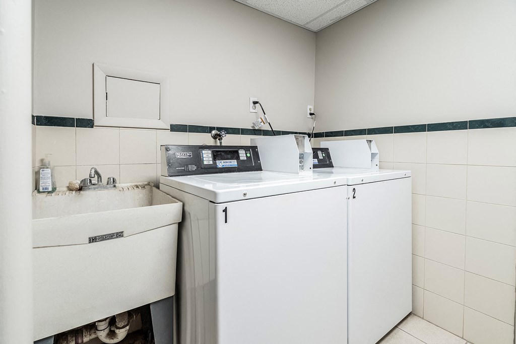 a kitchen with a stove and a sink