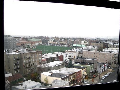 a view of a city from the window of a building
