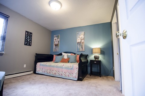 Spacious bedroom at Mason Hills Apartments in Mason, MI