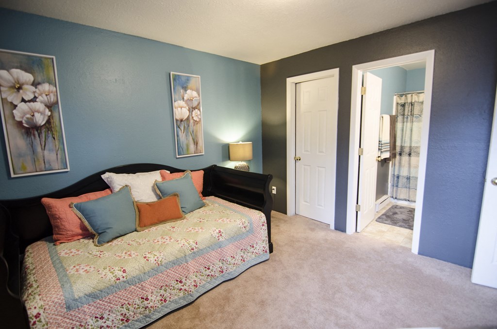 Spacious bedroom at Mason Hills Apartments in Mason, MI