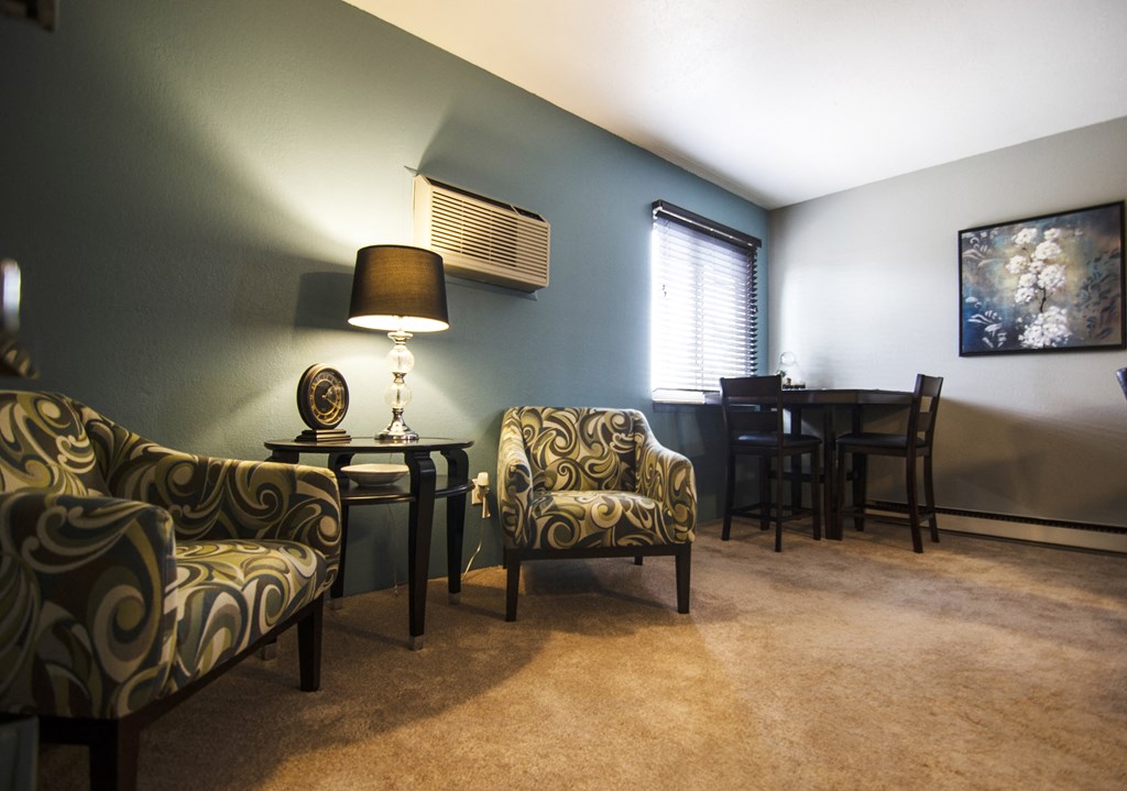 Living room at Mason Hills Apartments in Mason, MI