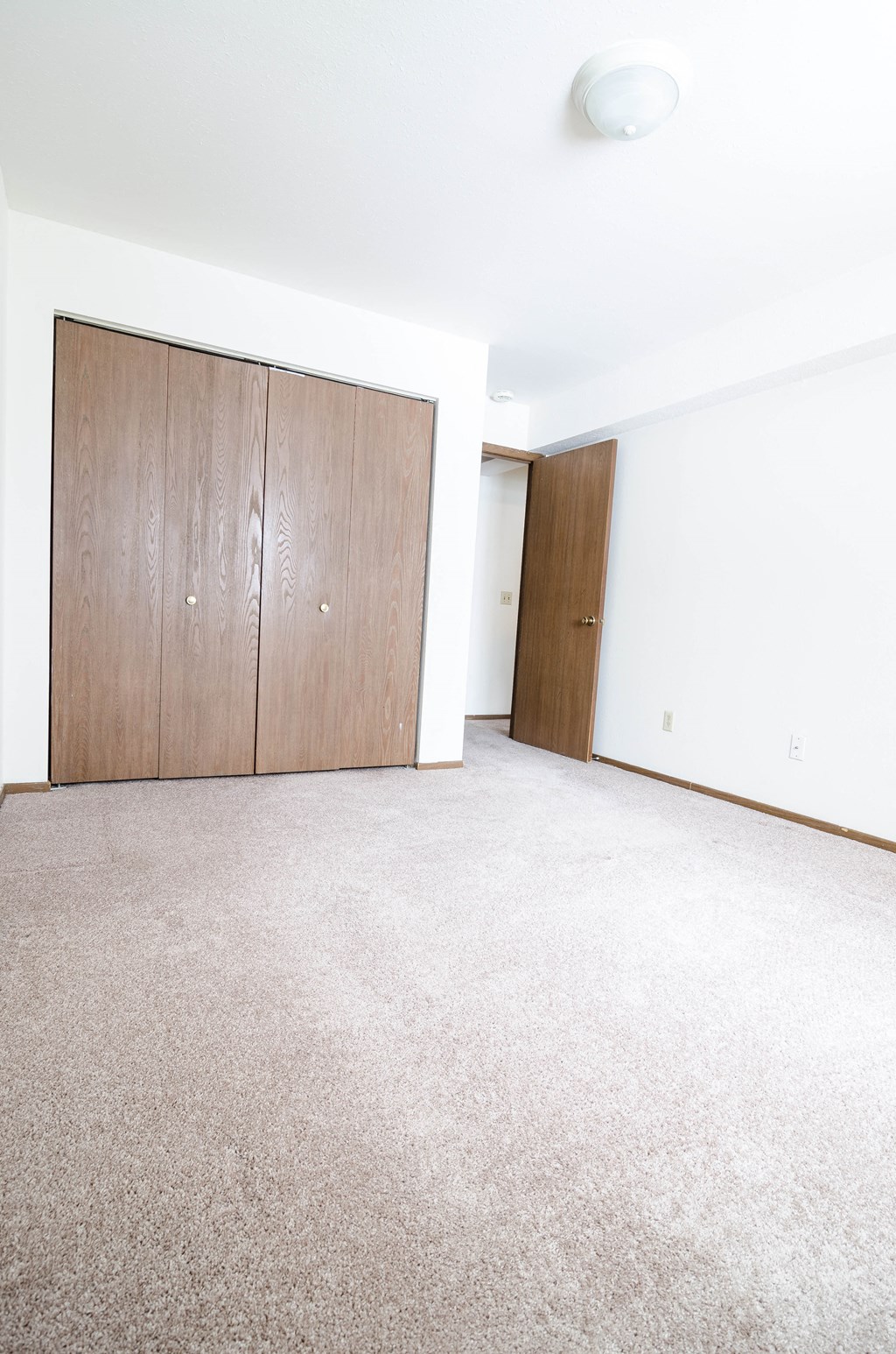 Bedroom at Sycamore apartments in Holt, MI
