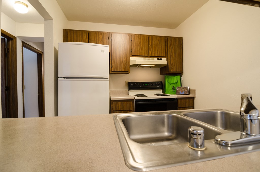 Kitchen at Sycamore Apartments in Holt, MI