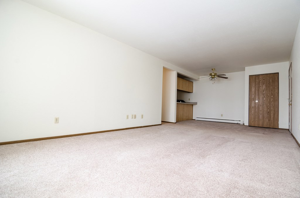 Living room at Sycamore Apartments in Holt, MI