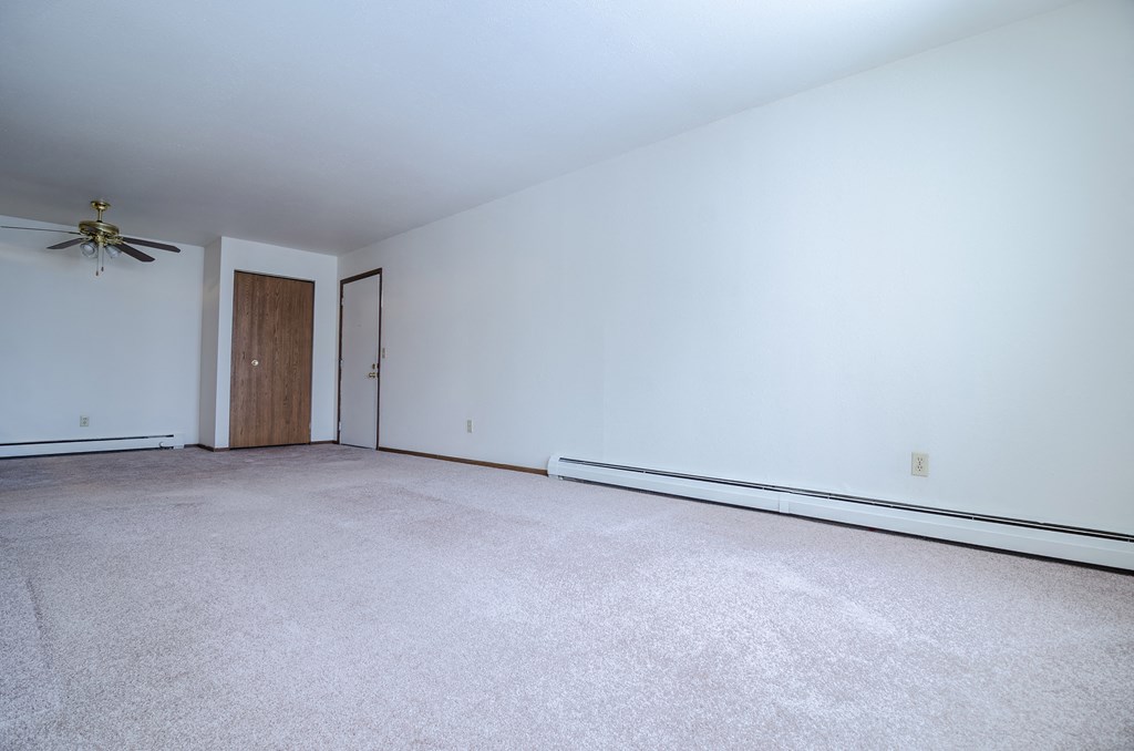 Living room at Sycamore Apartments in Holt, MI