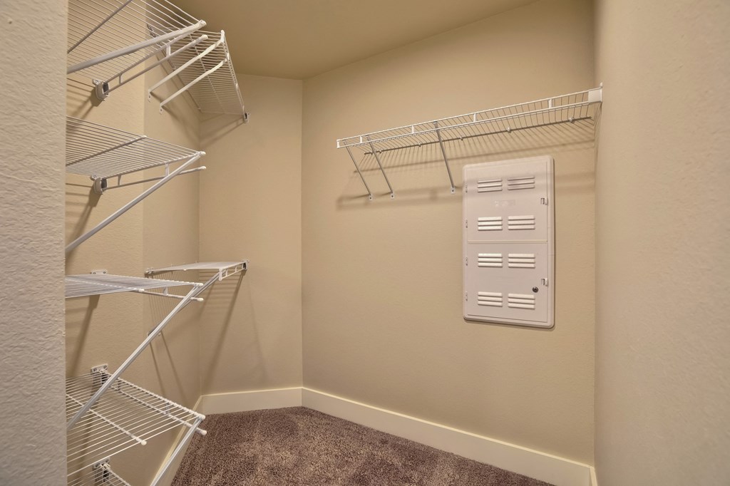 Walk in closet at Verndale Apartments in Lansing, MI 