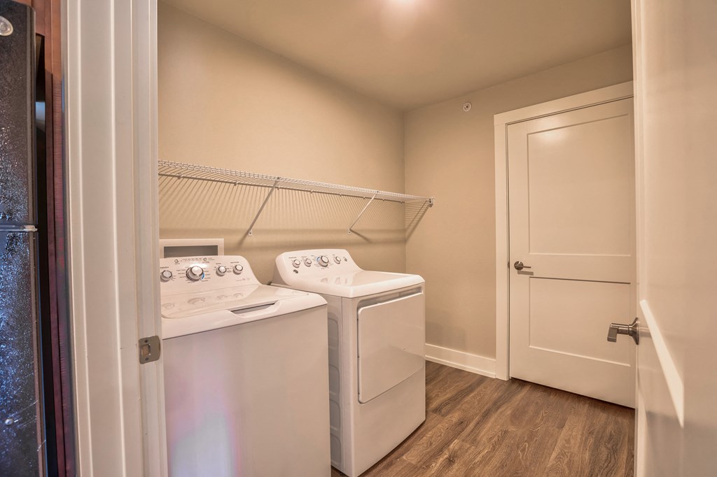 Washer dryer in apartment at Verndale Apartments in Lansing, MI 