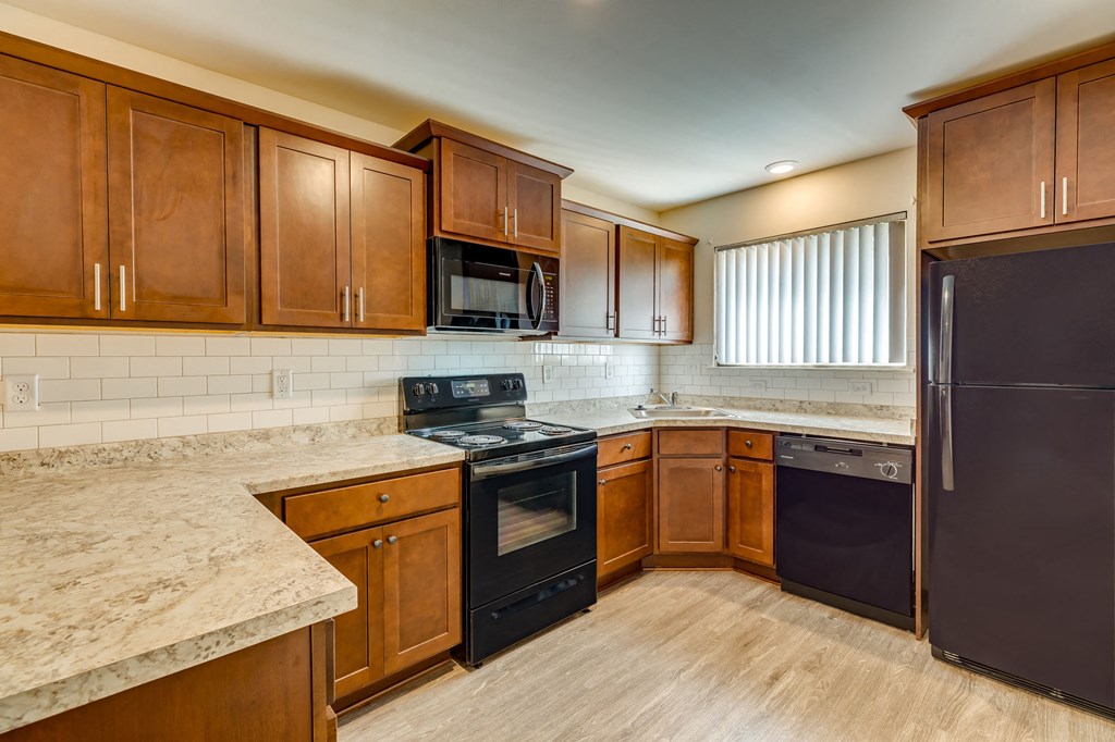 Kitchen at  Capitol Villa Apartments near Michigan State University in East Lansing, MI