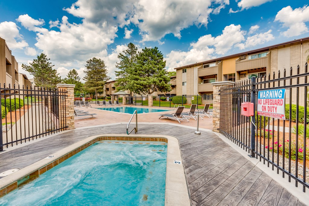 Pool and hot tub in East Lansing Apartments near Michigan State University | Capitol Villa Apartments near MSU