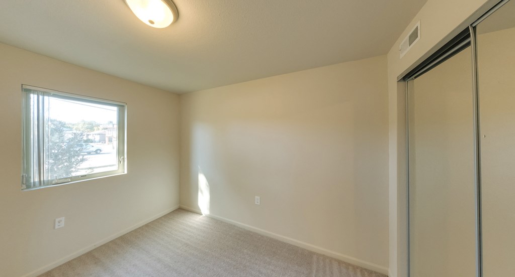 Spacious bedrooms in East Lansing Apartments near Michigan State University | Old Canton