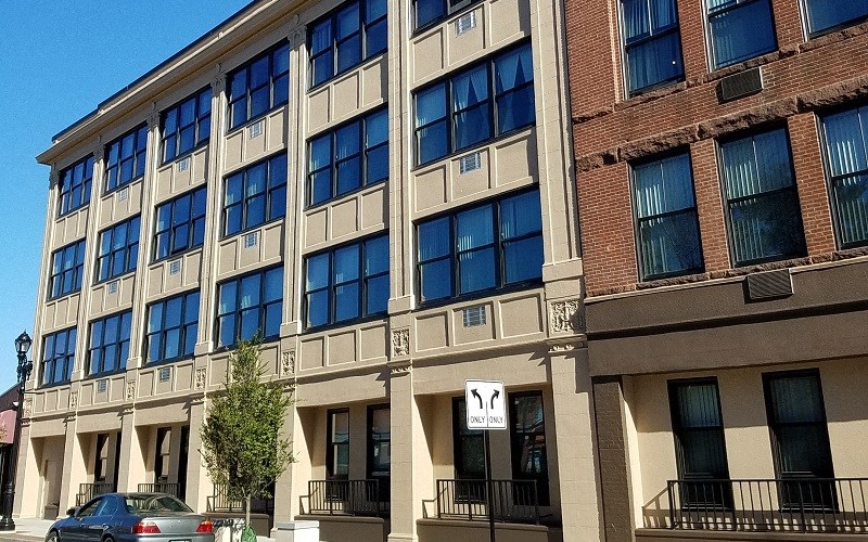a building with a car parked in front of it