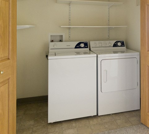 a washer and dryer in the laundry room of a home