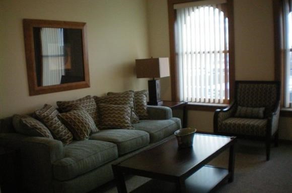 a living room with a couch and a coffee table