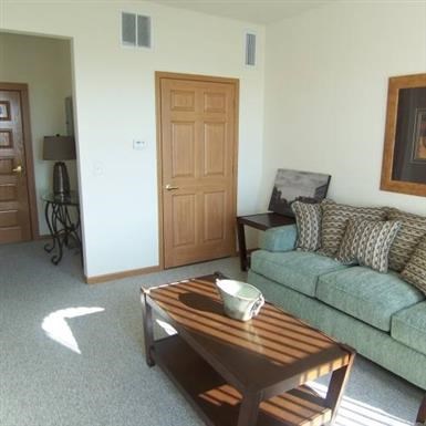 a living room with a couch and a coffee table