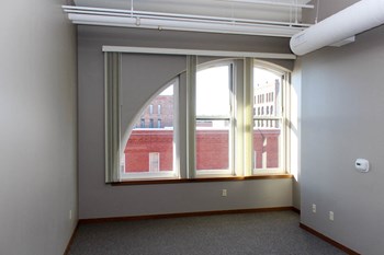 Unique living spaces Here this historic windows overlooking Court Street add interest to a Call Terminal living room. - Photo Gallery 3