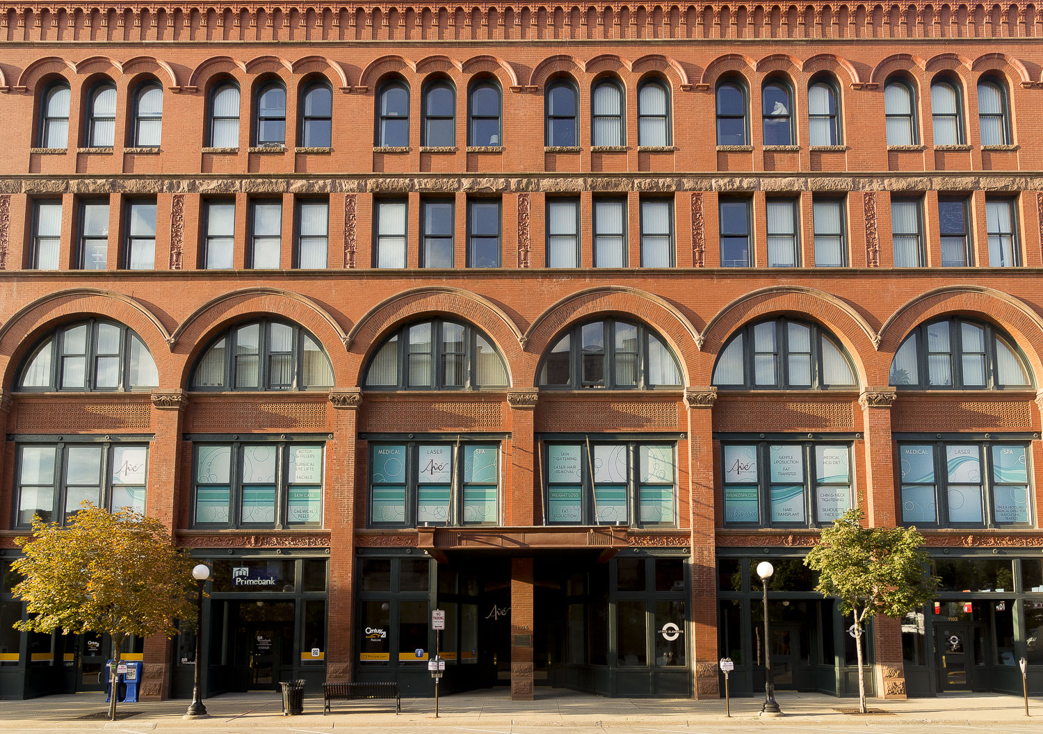 a large red brick building with many windows