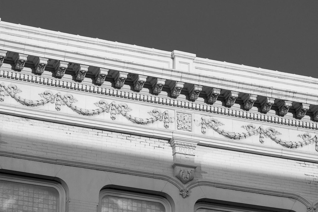 a black and white photo of the top of a building