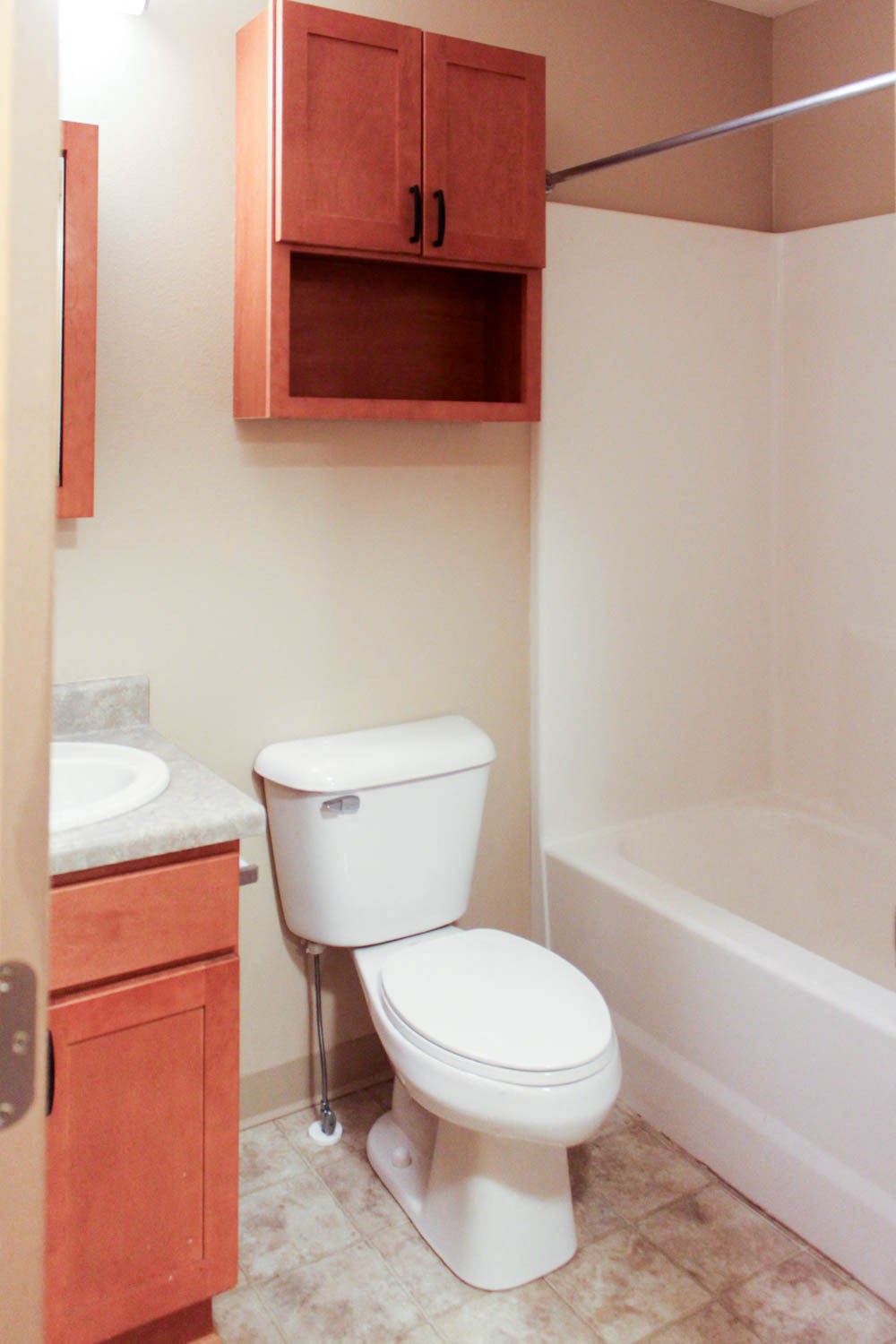 a bathroom with a toilet and a sink