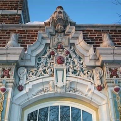 the top of a building with a clock on it