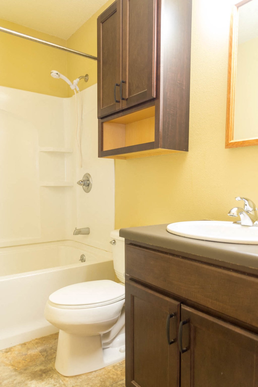 a bathroom with a toilet and a sink