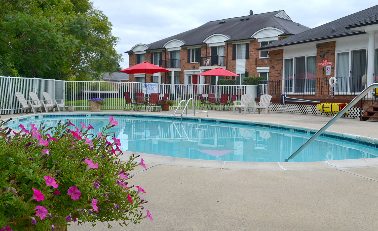 Swimming Pool with Lounge Chairs at French Quarter Apartments,Southfield,48034