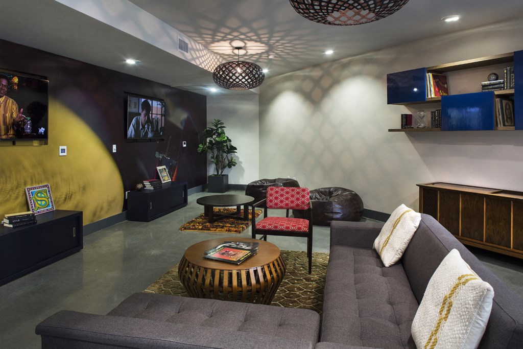 a living room with a couch and a table