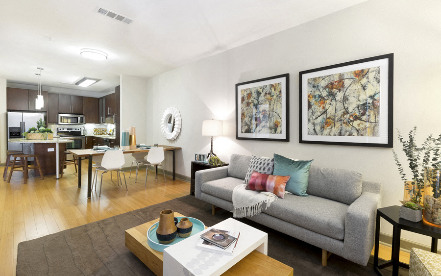 a living room with a couch and a table