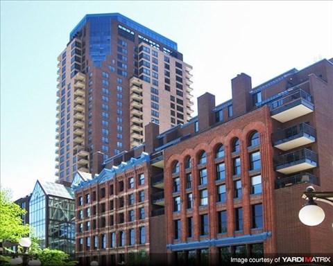 A cityscape with a mix of modern and traditional architecture.