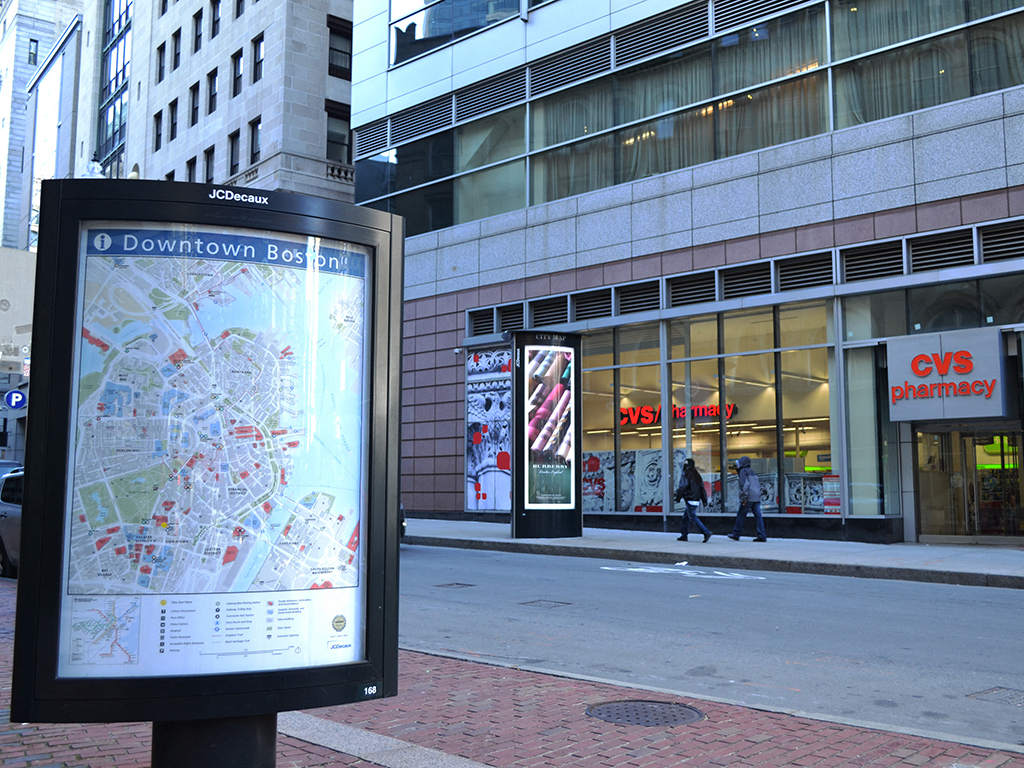 a map of downtown davenport on a street sign in front of a building