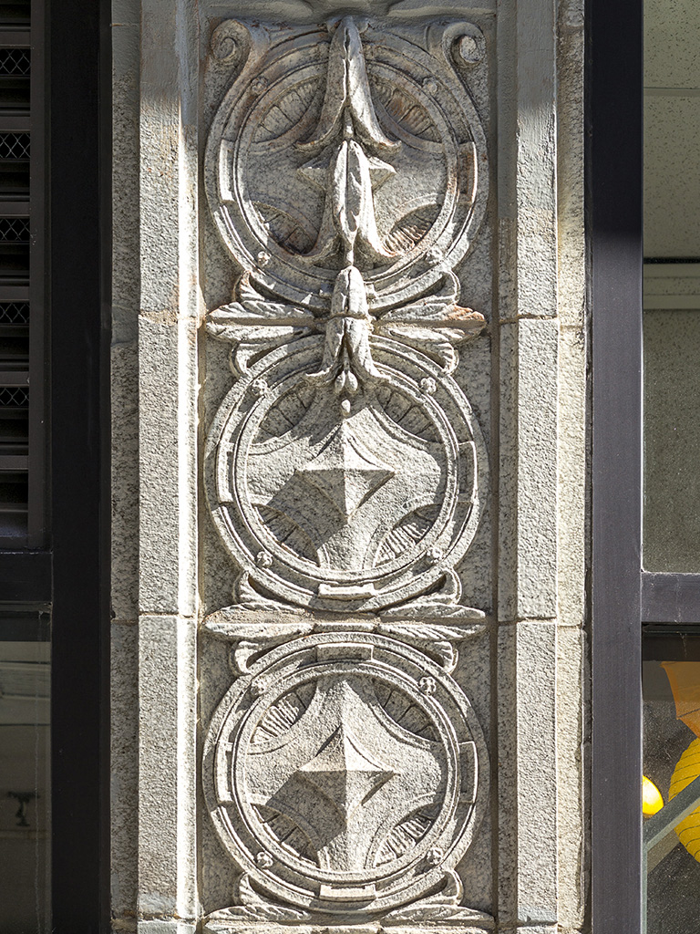 a sculpture on the side of a building