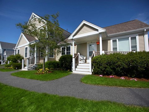 a house with a walkway in front of it