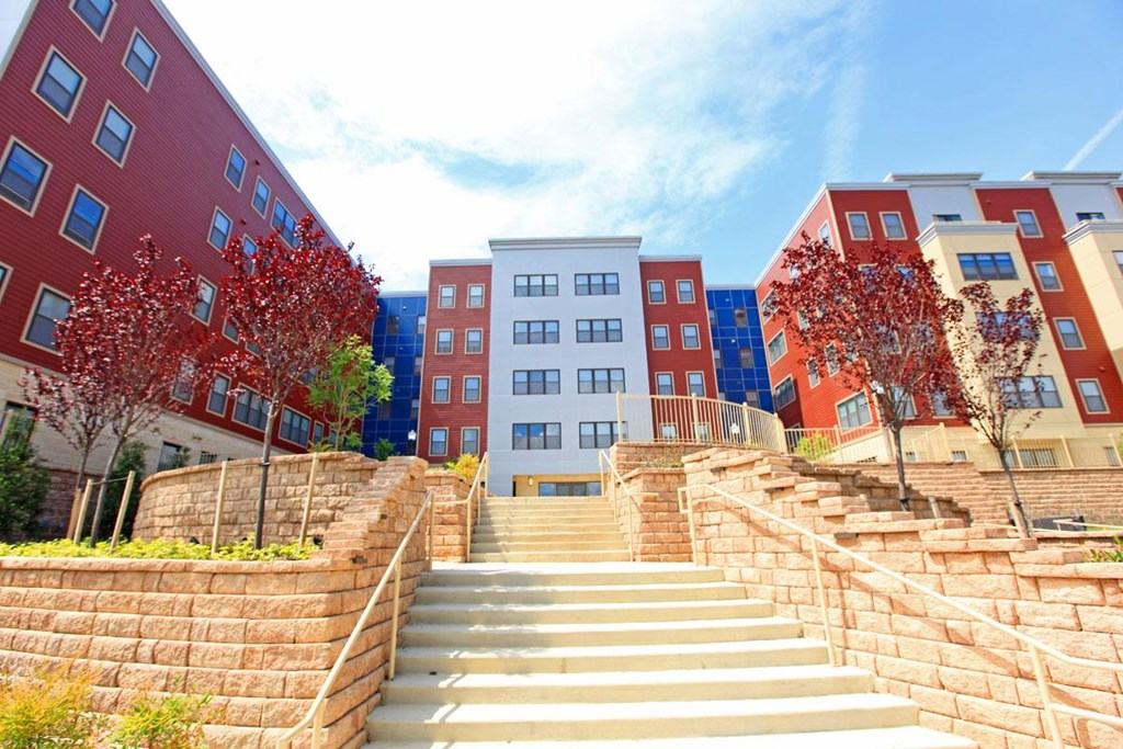 a set of stairs in front of some buildings