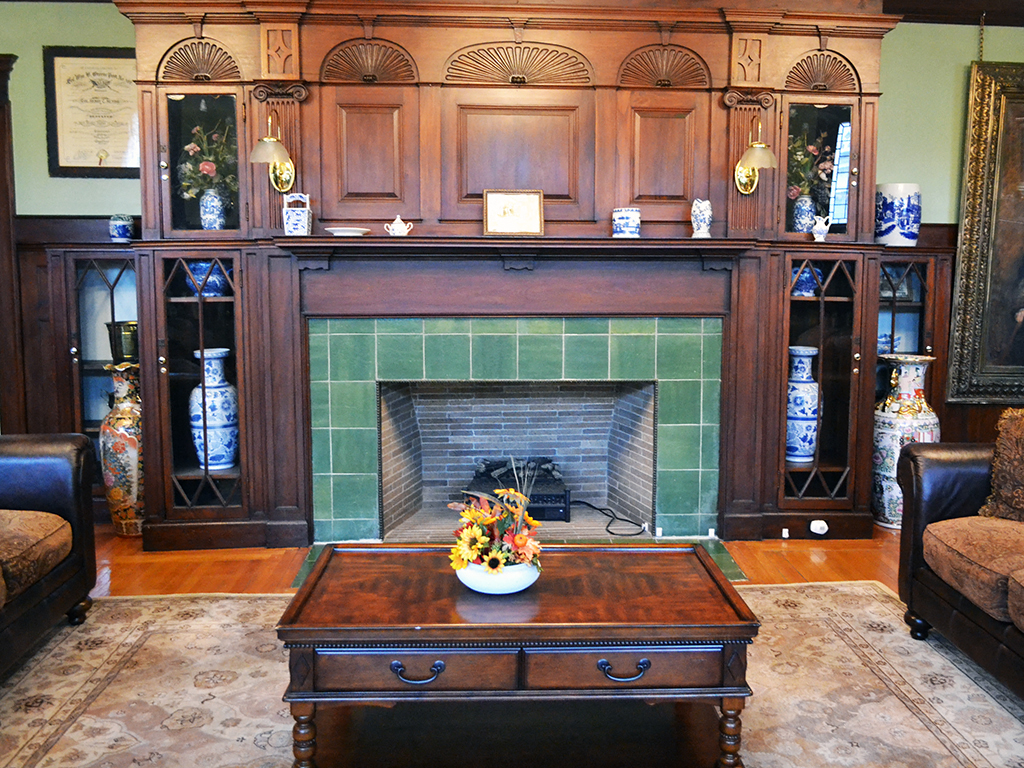 the living room has a fireplace and a coffee table