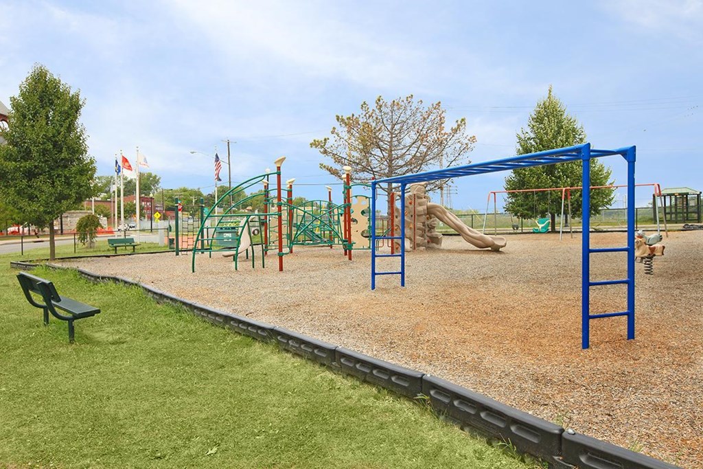 a playground at a park on a sunny day
