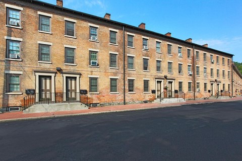 a large brick building on a city street