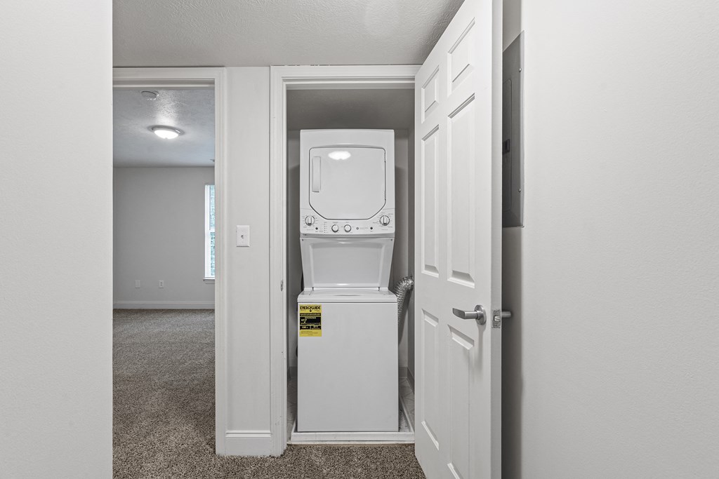 a washer and dryer in a small room