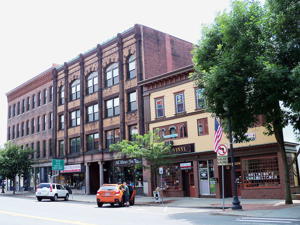 a building on the corner of a city street