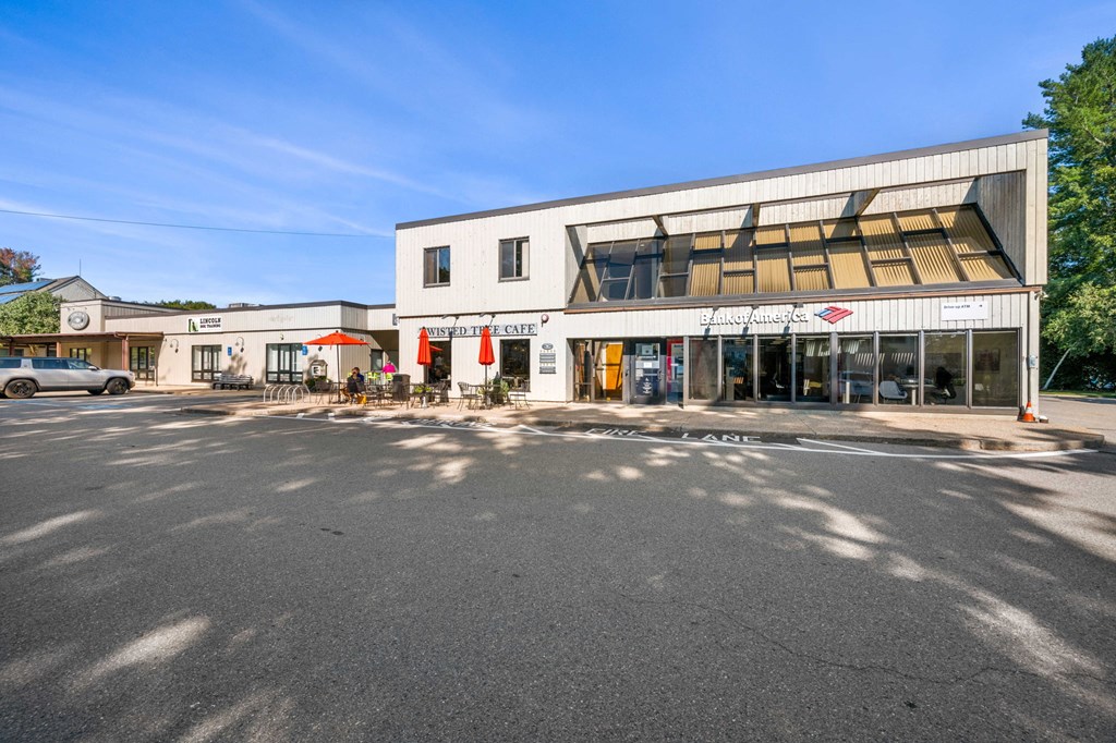 a large building with a street in front of it
