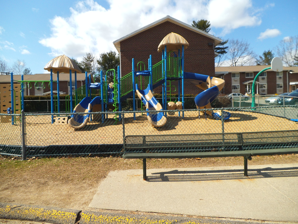 a playground at a school with slides on it