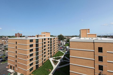 an aerial view of several buildings in a city