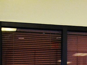 a pair of glass doors in an office
