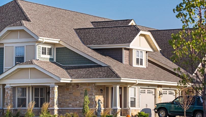 a house with a car parked in front of it