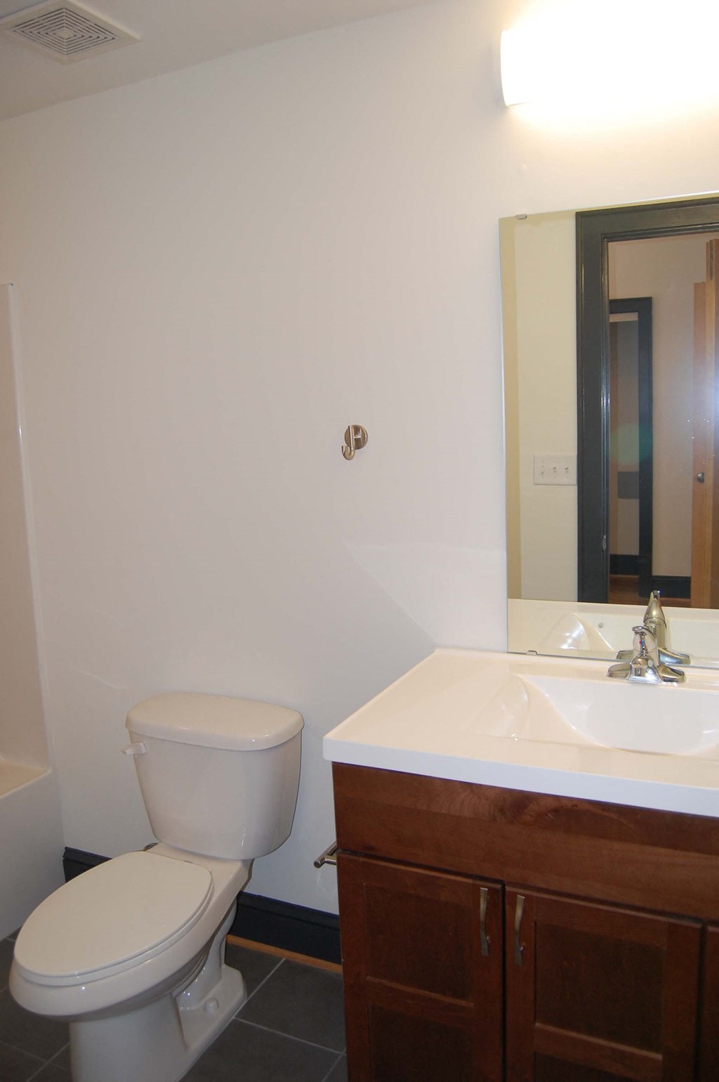 a bathroom with a toilet and a sink