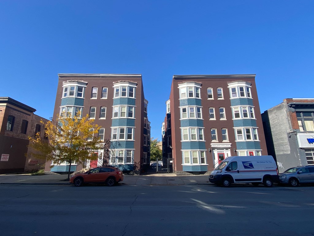 a view of a building on a city street