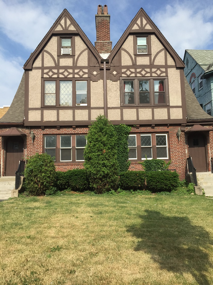 a house with a yard in front of it
