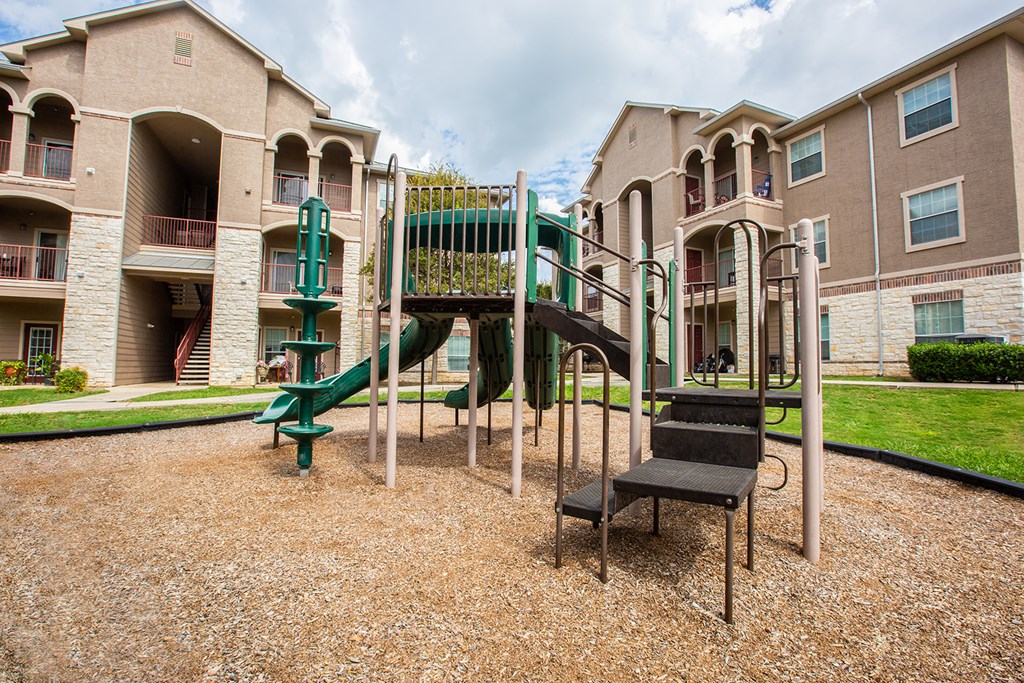 our apartments are equipped with a playground and a picnic table
