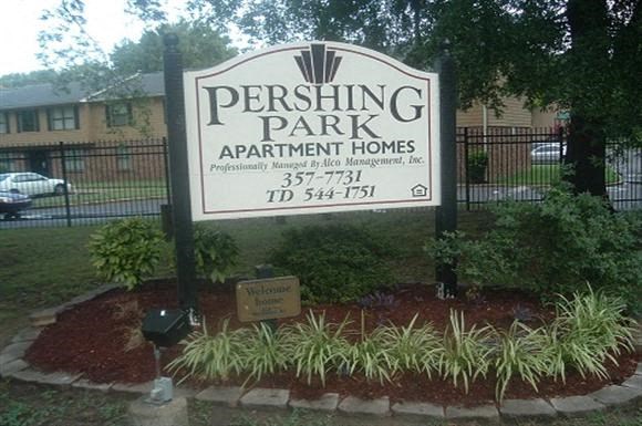 a sign for thepershing park apartment homes