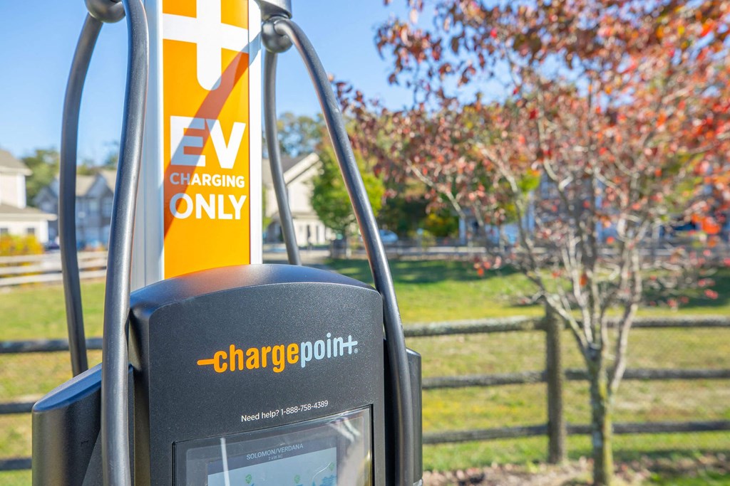 a gas pump with a sign that says ev charging only